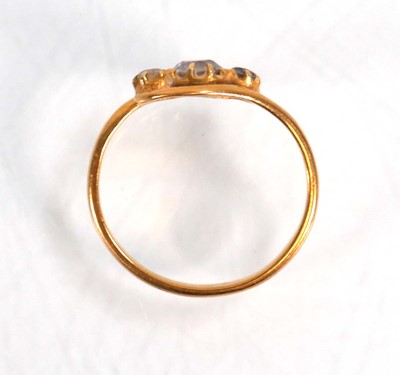 Lot 588 - A yellow metal crossover ring set three...