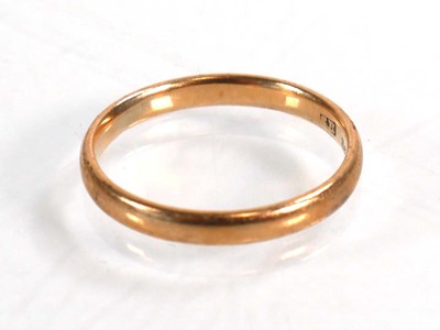 Lot 589 - A 9ct yellow gold wedding band, Birmingham...