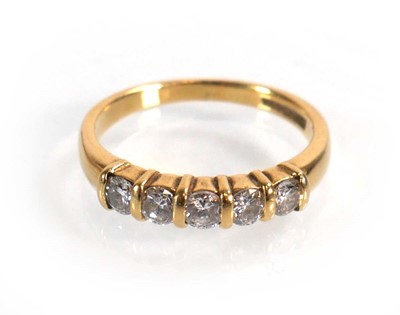 Lot 591 - An 18ct yellow gold half eternity ring set...