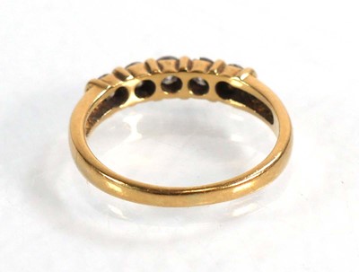 Lot 591 - An 18ct yellow gold half eternity ring set...