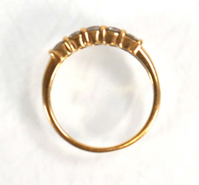 Lot 591 - An 18ct yellow gold half eternity ring set...
