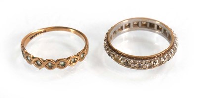 Lot 602 - A 9ct yellow gold half eternity ring set paste,...