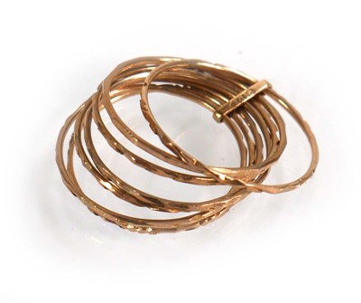 Lot 605 - A 14ct yellow gold multi band ring, ring size...