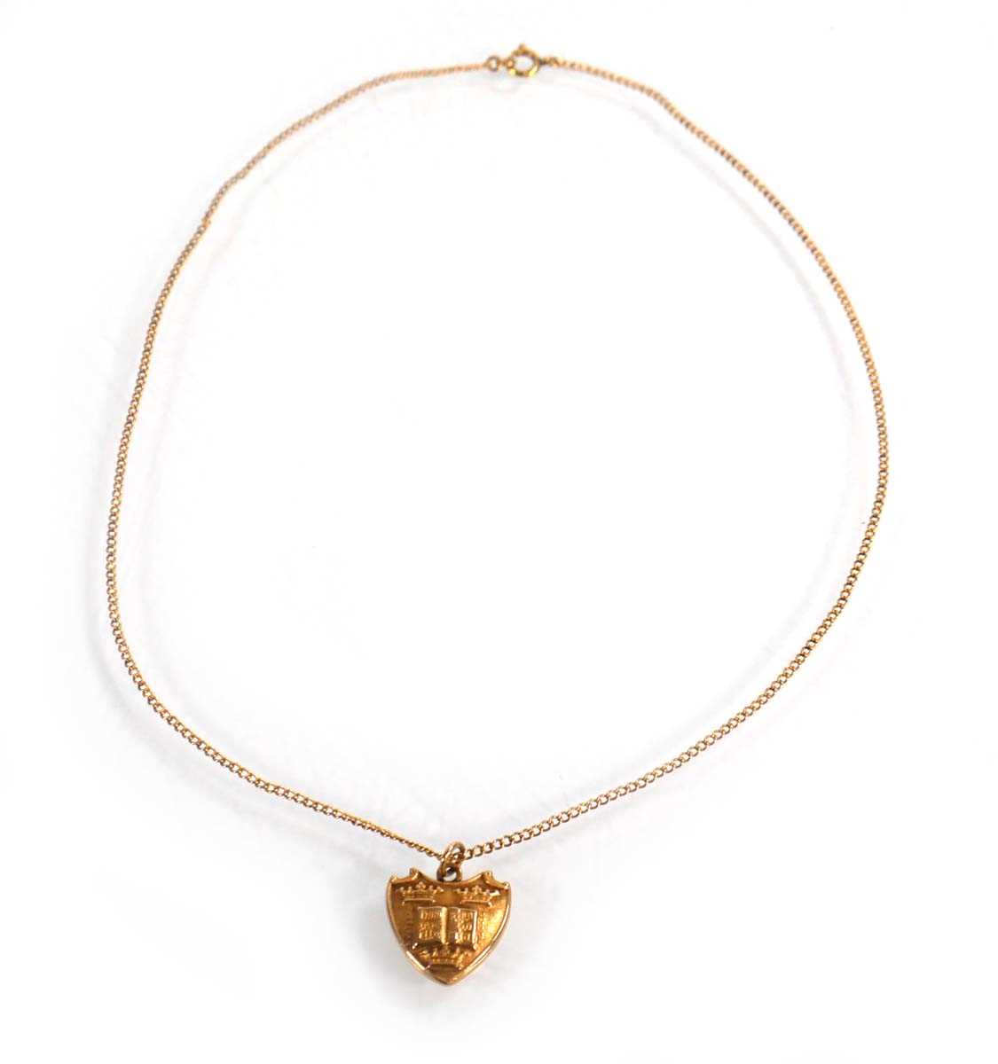 Lot 606 - A 9ct yellow gold fine curblink necklace...