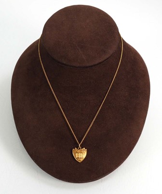 Lot 606 - A 9ct yellow gold fine curblink necklace...