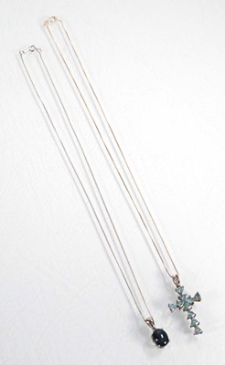 Lot 607 - A silver fine curblink necklace suspending a...