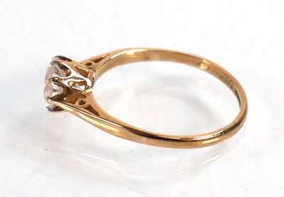 Lot 608 - A 9ct yellow gold ring set cubic zirconia,...