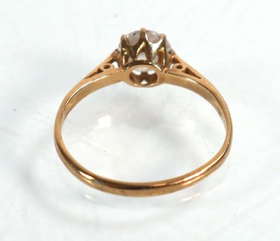 Lot 608 - A 9ct yellow gold ring set cubic zirconia,...