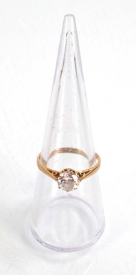 Lot 608 - A 9ct yellow gold ring set cubic zirconia,...