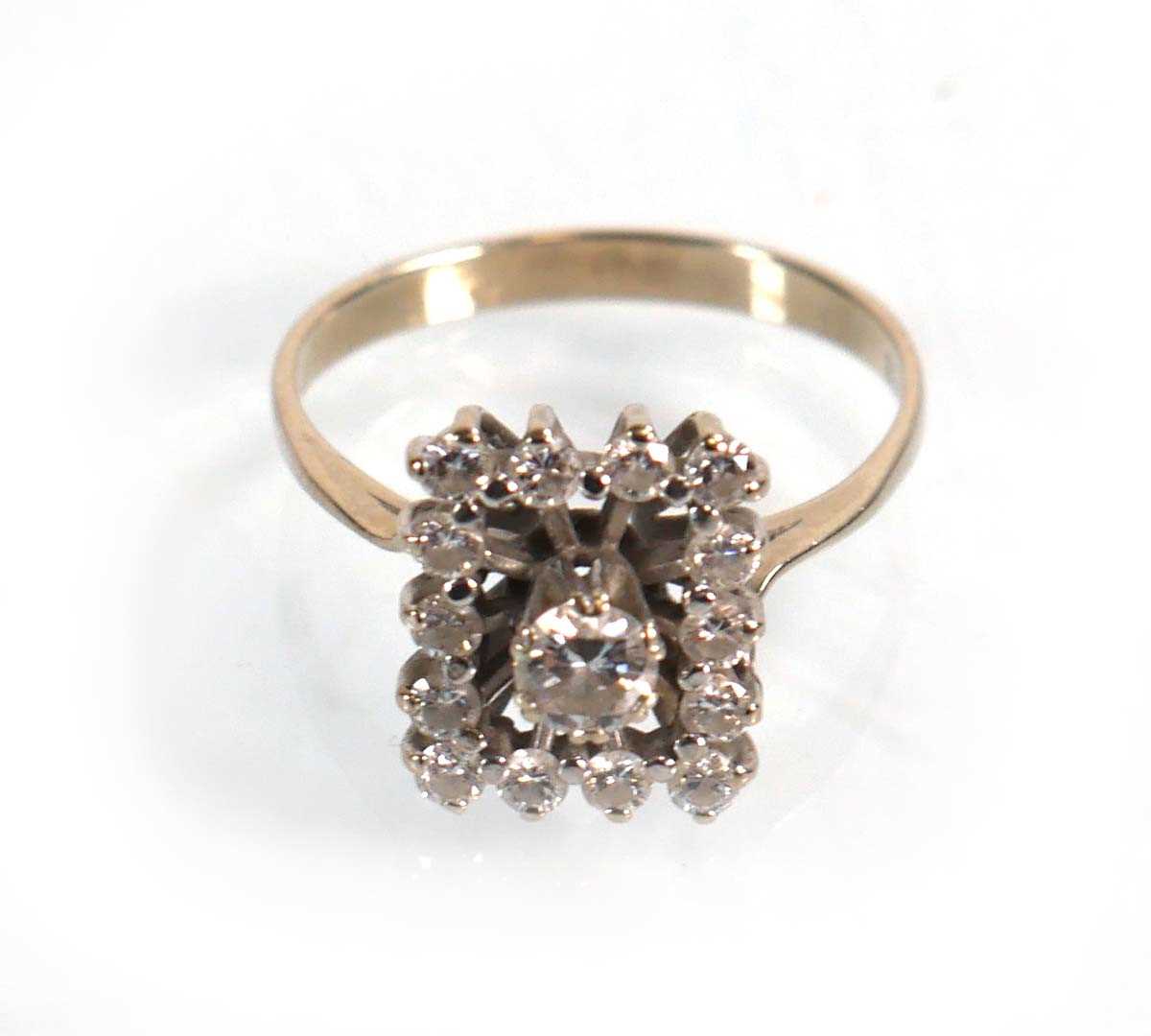 Lot 609 - A 14ct white gold ring set fifteen brilliant...
