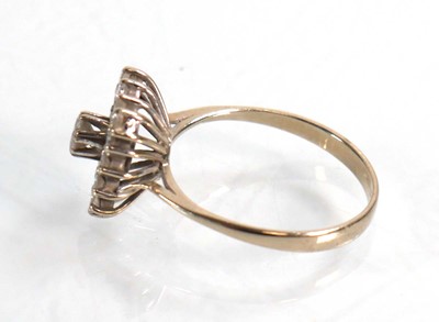 Lot 609 - A 14ct white gold ring set fifteen brilliant...