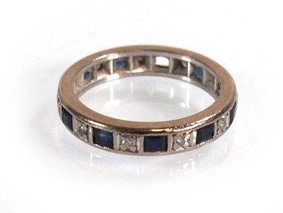 Lot 610 - A white metal eternity ring set small...
