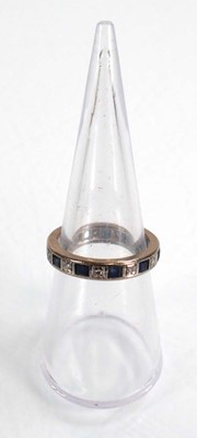 Lot 610 - A white metal eternity ring set small...