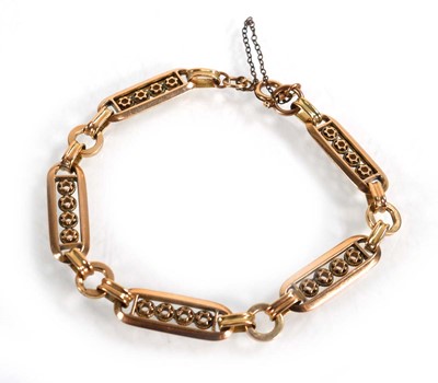 Lot 619 - A yellow metal fancy link bracelet, l. 20 cm,...