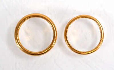 Lot 620 - A 22ct yellow gold wedding band, Birmingham...