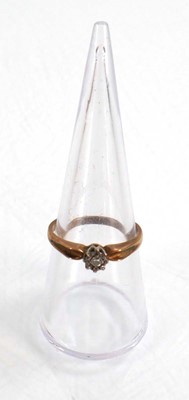 Lot 621 - A 9ct yellow gold ring set small diamond in an...