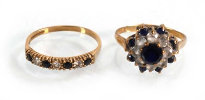 Lot 622 - Two 9ct yellow gold dress ring set clear and...