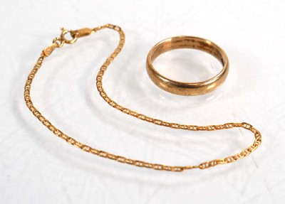 Lot 623 - A 9ct yellow gold wedding band, ring size P...