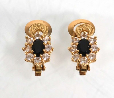 Lot 626 - A pair of 14ct yellow gold ear clips, each set...