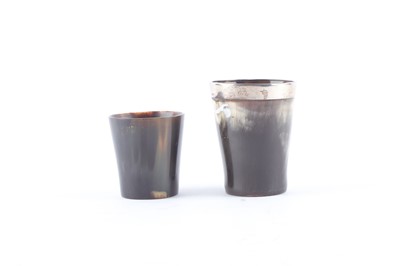Lot 1045 - Two horn beakers, one with silver rim and...