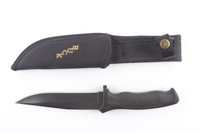 Lot 1004 - Buck 650 with 6¼ ins black clip pointed blade,...
