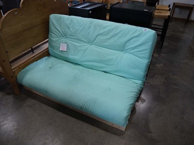 Lot 1024 - Pine double futon with light blue cushion