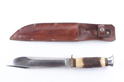 Lot 1005 - Bowie knife with 8 ins clip pointed fullered...