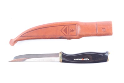 Lot 1008 - Normark sheath knife with 4¾ ins single edged...