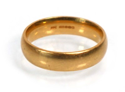 Lot 634 - An 18ct yellow gold wedding band, Sheffield...