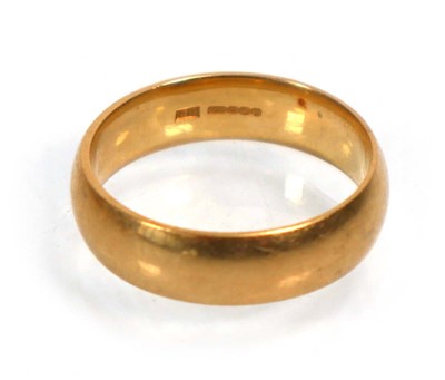 Lot 635 - An 18ct yellow gold wedding band, Sheffield...