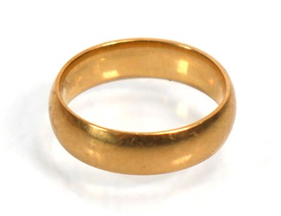 Lot 635 - An 18ct yellow gold wedding band, Sheffield...