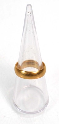 Lot 635 - An 18ct yellow gold wedding band, Sheffield...