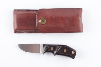 Lot 1038 - Small Sheath Knife with 2¼ ins half round...