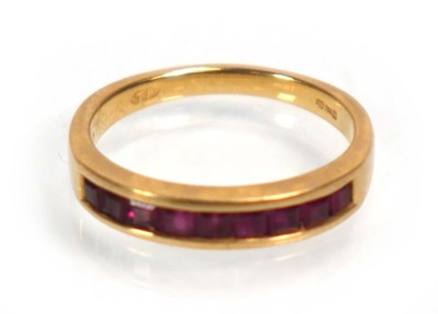 Lot 636 - An 18ct yellow gold half eternity ring set...