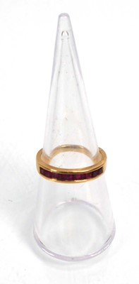 Lot 636 - An 18ct yellow gold half eternity ring set...