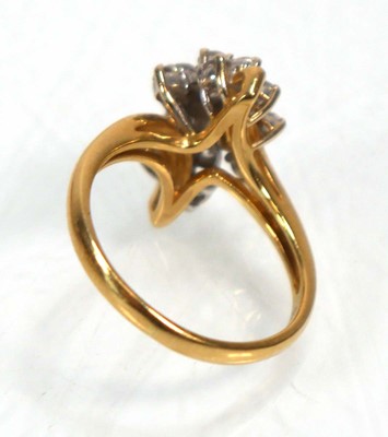 Lot 638 - An 18ct yellow gold cluster ring set seventeen...