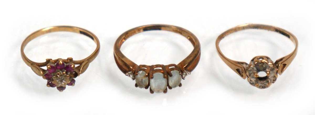 Lot 642 - Three 9ct yellow gold dress rings including...