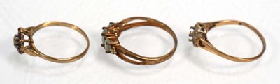 Lot 642 - Three 9ct yellow gold dress rings including...