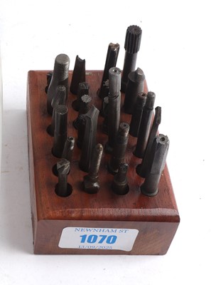 Lot 1070 - Wooden block with 24 vintage gunmakers cutting...