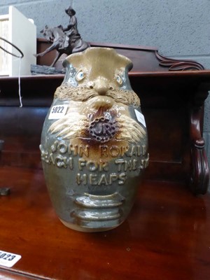 Lot 5022 - Green glazed pottery jug