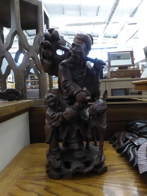 Lot 5103 - Carved Chinese figure of a fisherman, boy and...