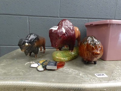 Lot 5053 - 3 Bison figures, plus lighter and key holders