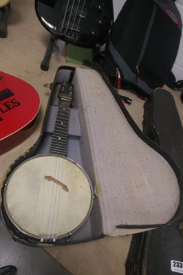 Lot 2340 - Banjo in a case
