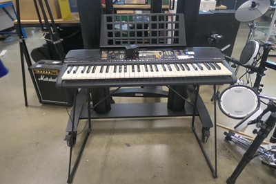 Lot 2601 - Yamaha PSR195 piano on a stand