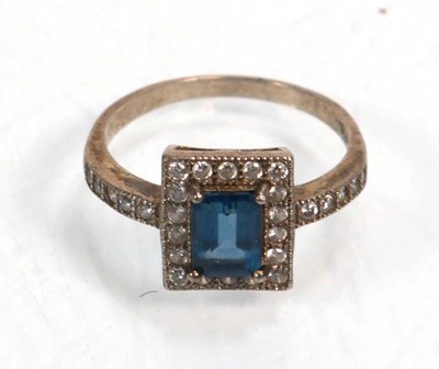 Lot 648 - Twelve silver dress rings including an half...