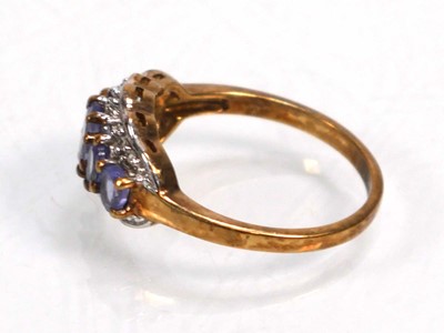 Lot 648 - Twelve silver dress rings including an half...