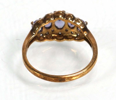 Lot 648 - Twelve silver dress rings including an half...