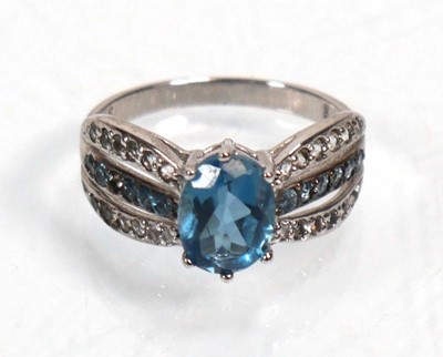 Lot 648 - Twelve silver dress rings including an half...
