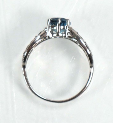 Lot 648 - Twelve silver dress rings including an half...
