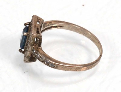 Lot 648 - Twelve silver dress rings including an half...